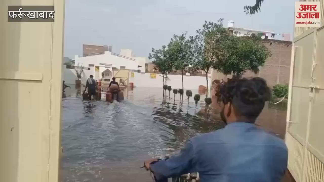Gas warehouse submerged, consumers going through water to get cooking gas