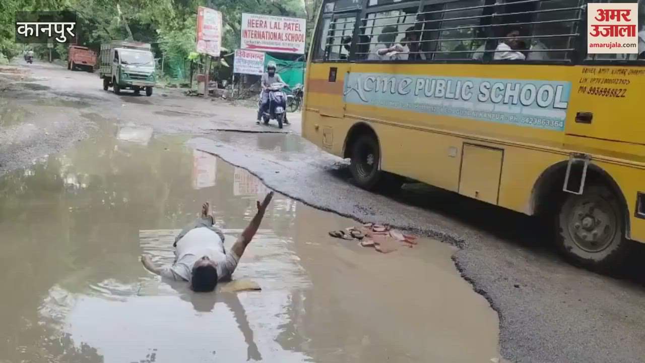 Unique protest against waterlogging in potholes