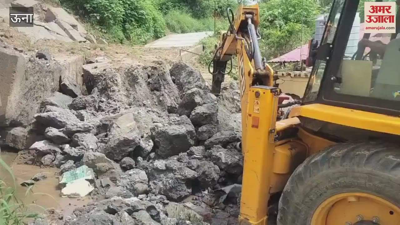 Una PWD machinery busy in restoring the closed connecting roads after heavy rains