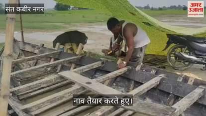 Villagers of the flood-affected area are busy preparing boats in view of the flood