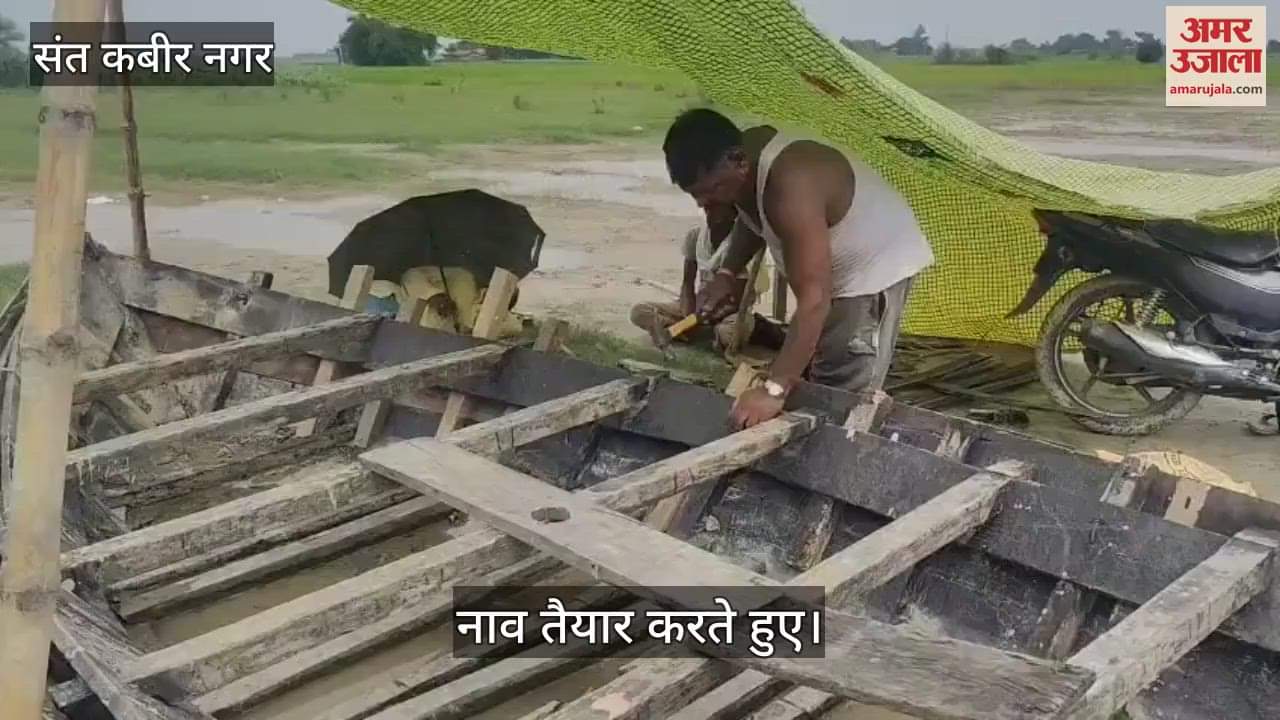 Villagers of the flood-affected area are busy preparing boats in view of the flood