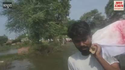 Funeral procession through waterlogging