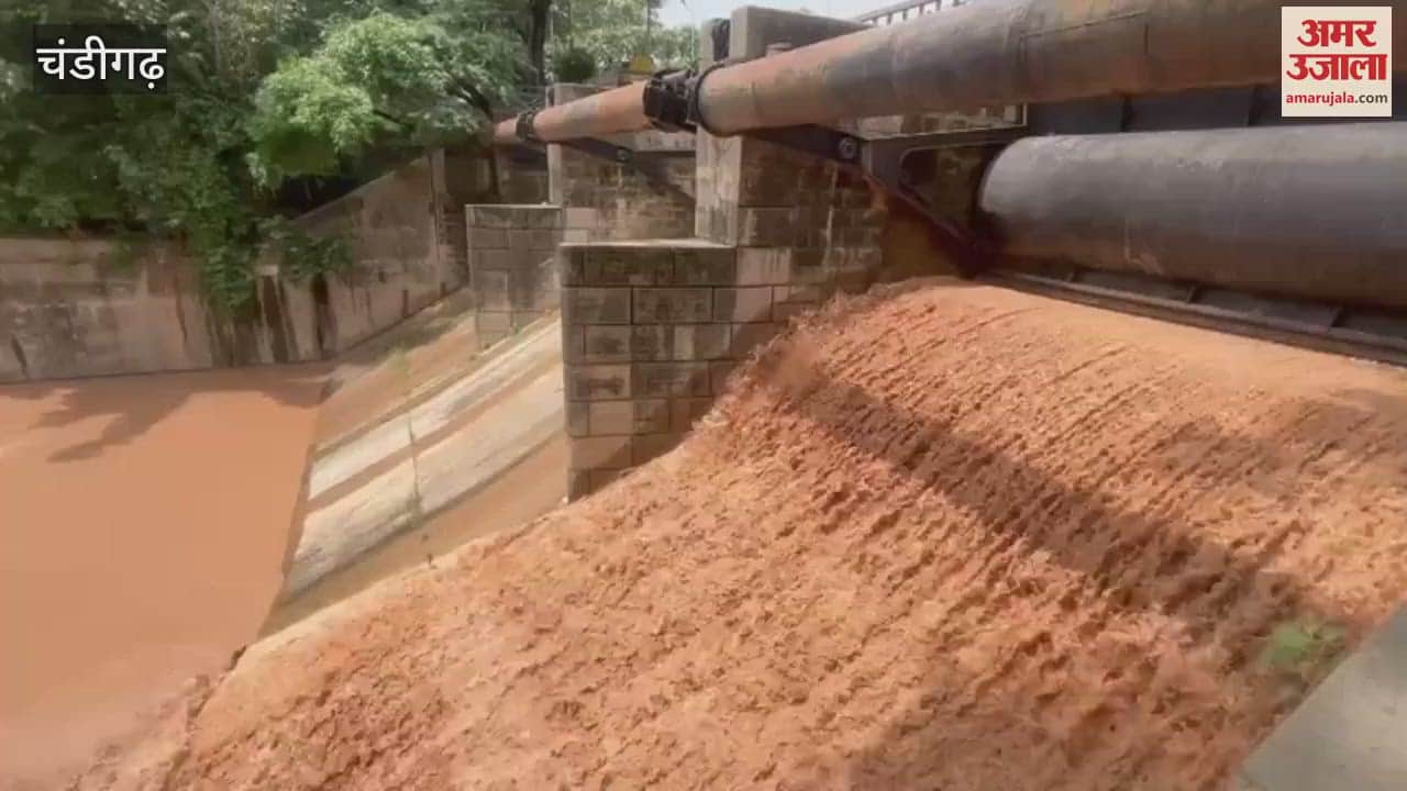 Sukhna Lake flood gates open