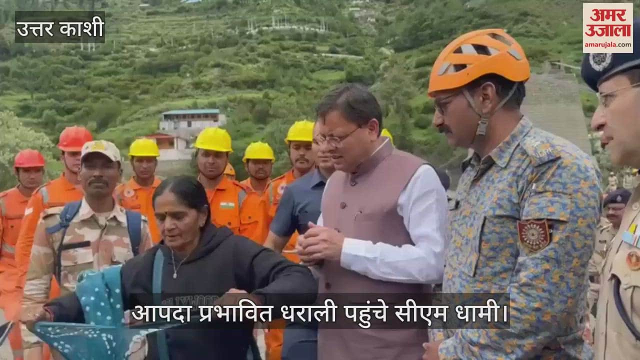 disaster-affected woman tore a piece of sari and tied a rakhi on CM Dhami's wrist In Dharali