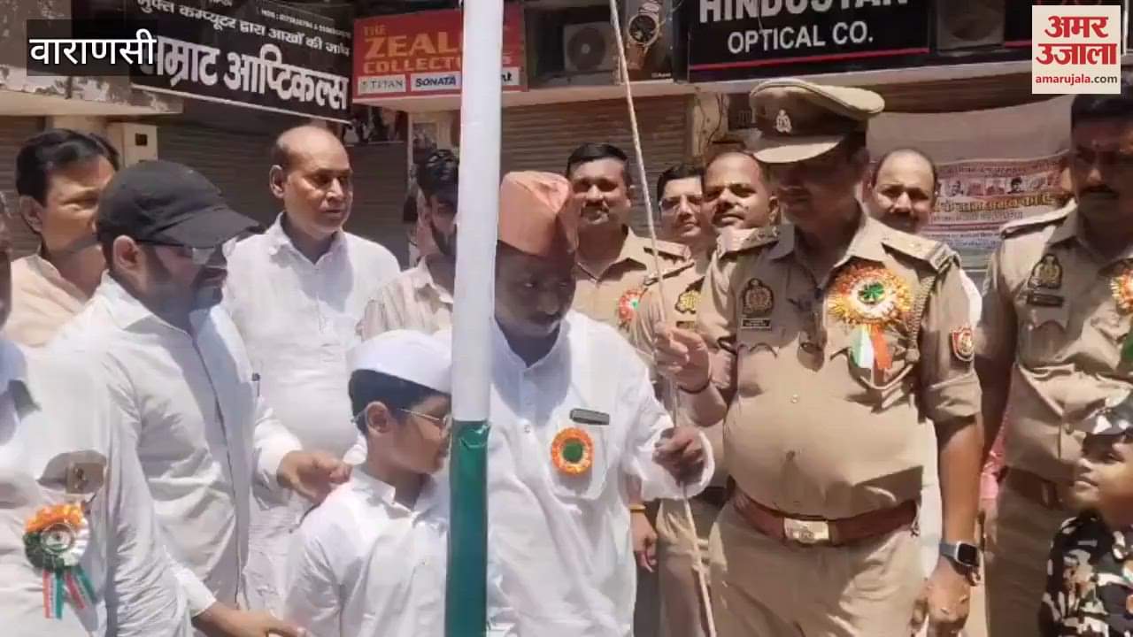 Derbyshire Club hoisted flag with policemen in varanasi