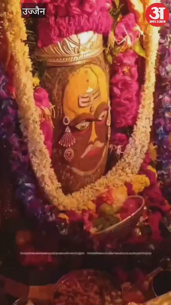 Wearing Tripund and rose garland forehead, Baba Mahakal seen in a unique during Bhasma Aarti today