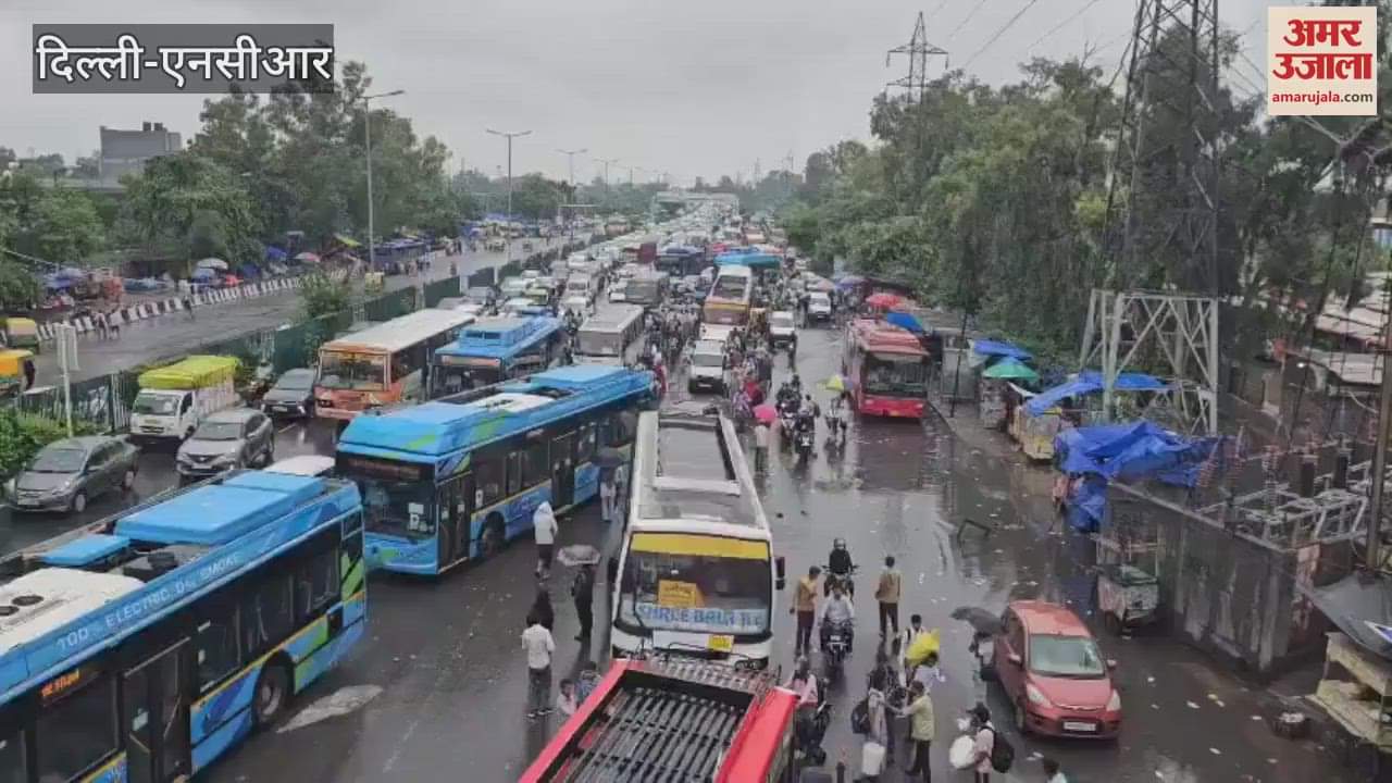 Long traffic jam due to rain in Anand Vihar, East Delhi