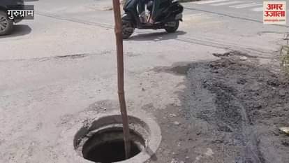 Sewer lid lying open on the road near Sector 15 Road Police Line