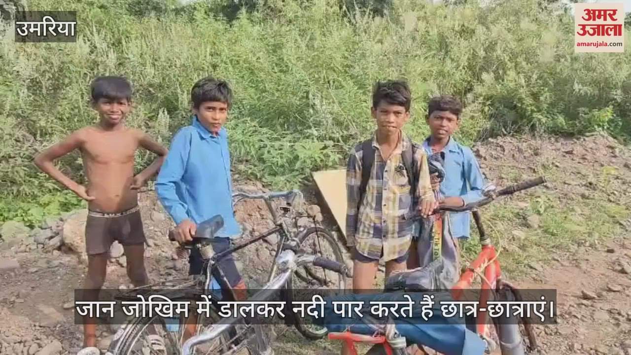 Students and villagers cross the river risking their lives