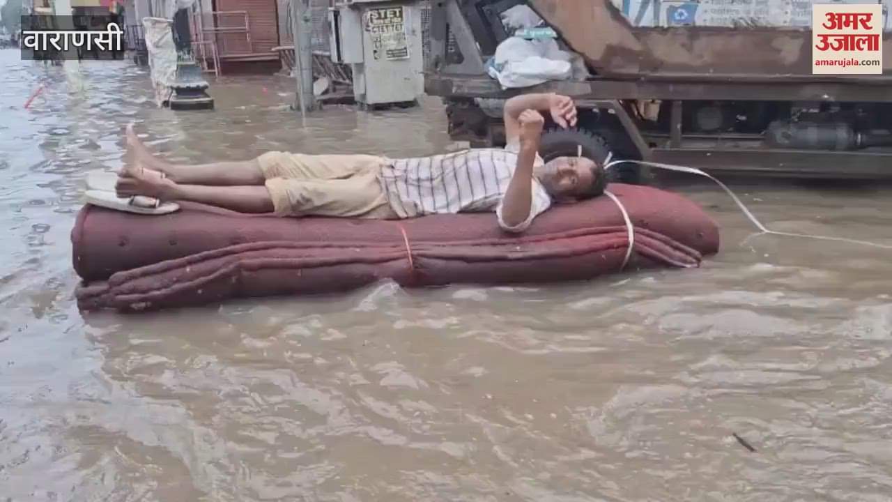 Enjoyed laying mattress amidst waterlogging in Varanasi