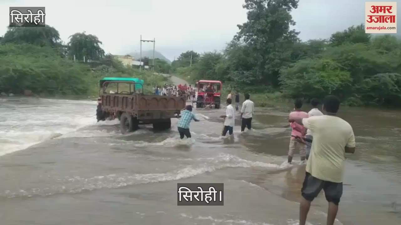 Tractor trolley got swept away while trying to cross the landslide amid the strong flow of water