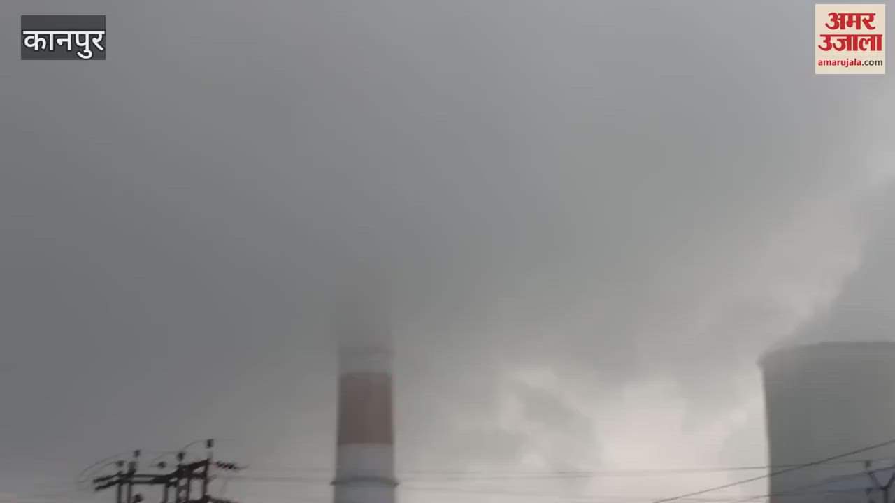 Panki power plant hidden by dark clouds during heavy rain