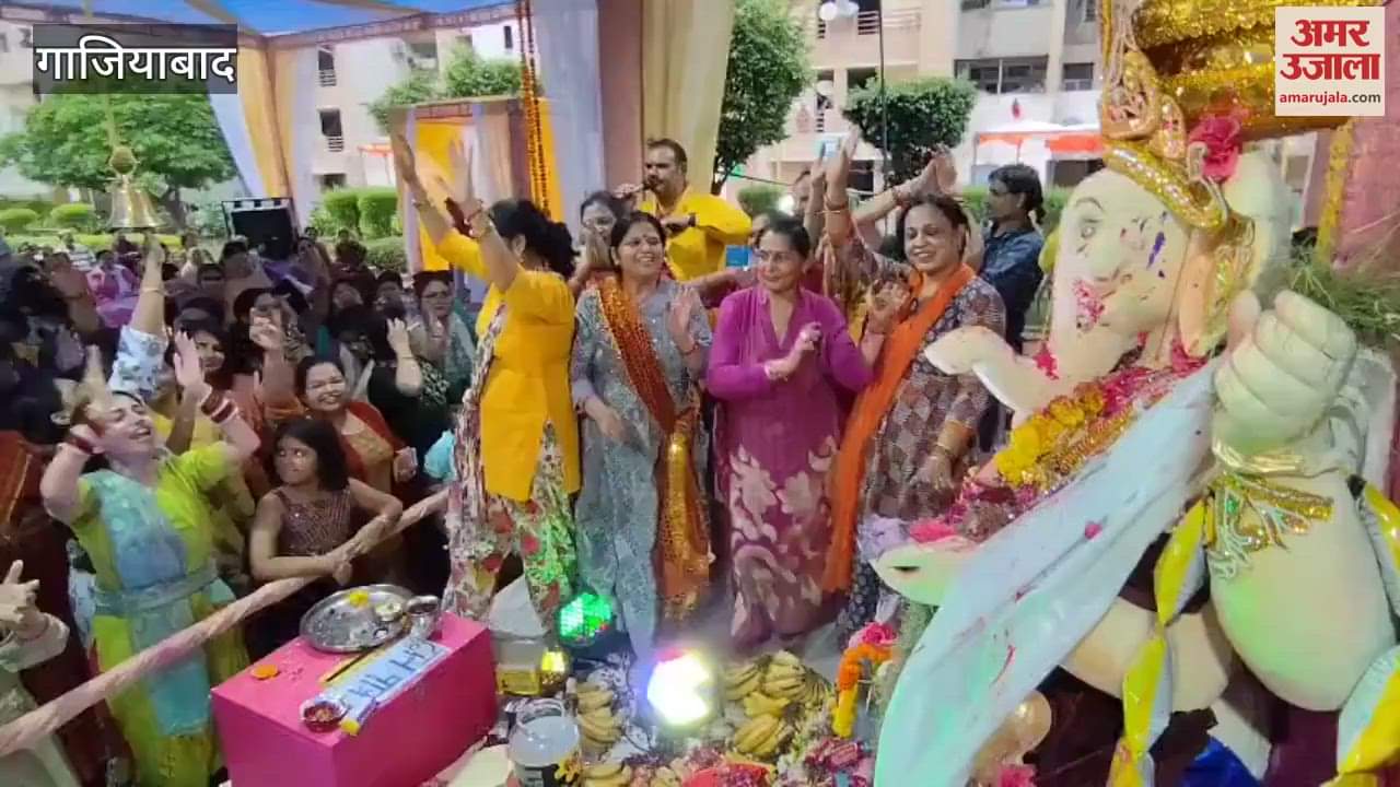 Female devotees danced with enthusiasm during the immersion of Bappa in a society
