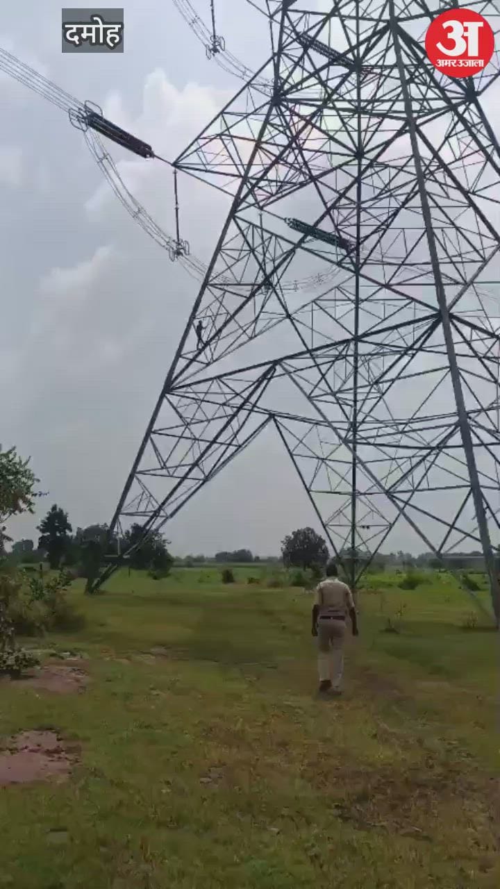 The lover climbed the tower of the high tension line to express his love