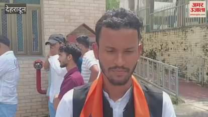 ABVP students started a sit-in protest at the main gate of DSW building of Garhwal University regarding various demands