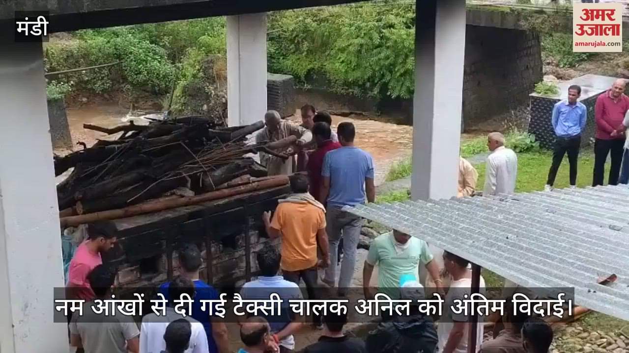 Taxi driver Anil was given a tearful farewell, his three-year-old son lit the funeral pyre
