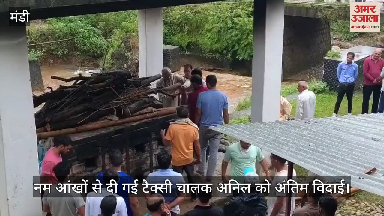 Taxi driver Anil was given a tearful farewell, his three-year-old son lit the funeral pyre