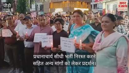 Teachers in Srinagar held a silent candlelight march