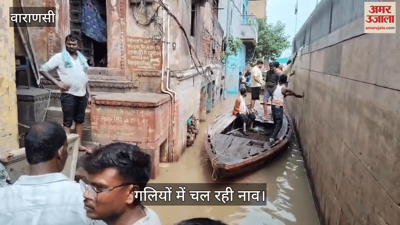 Flood in Varanasi Boats running in streets of Manikarnika Ghat