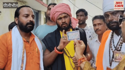 Two men wandering around dressed as monks caught by people in Pilibhit