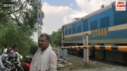 When the youth put his hand on the railway gate, suddenly the siren started ringing