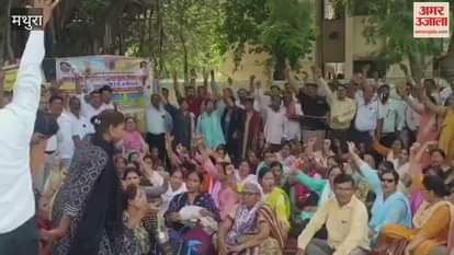 Teachers protest at DM office against making TET compulsory
