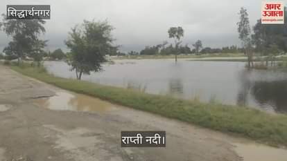 Dhanohara village surrounded by rising water level of Rapti river