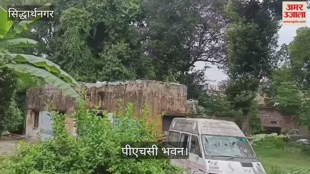 Health workers forced to spend the night by putting a sheet on the leaking roof of a dilapidated building.