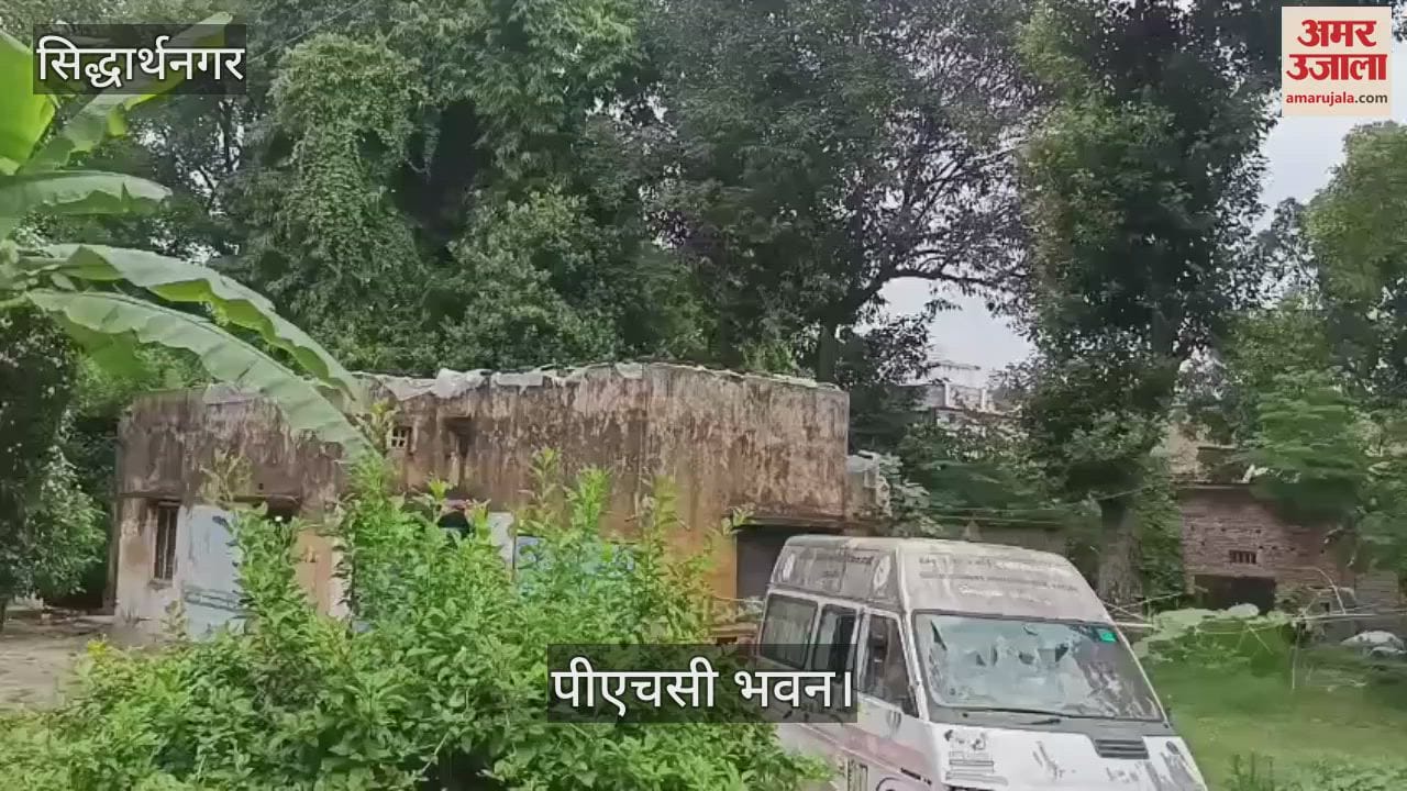 Health workers forced to spend the night by putting a sheet on the leaking roof of a dilapidated building.