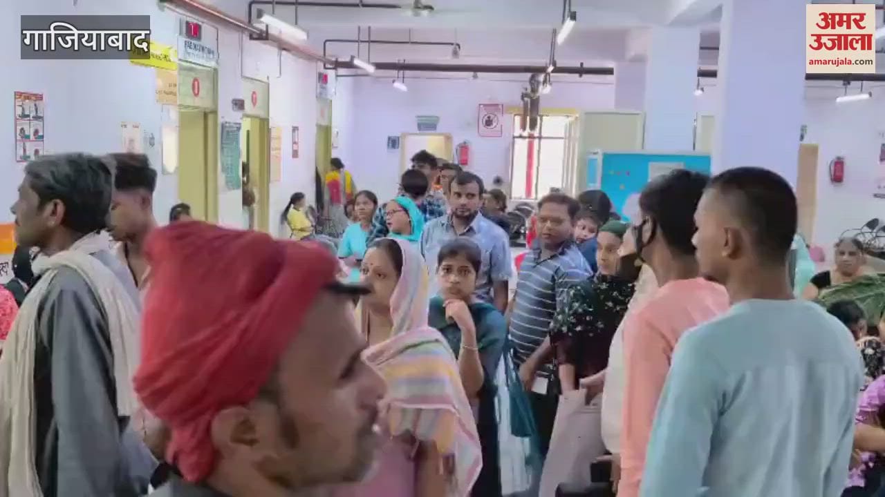 Due to increasing heat there is a long queue of patients in the OPD of MMG Hospital