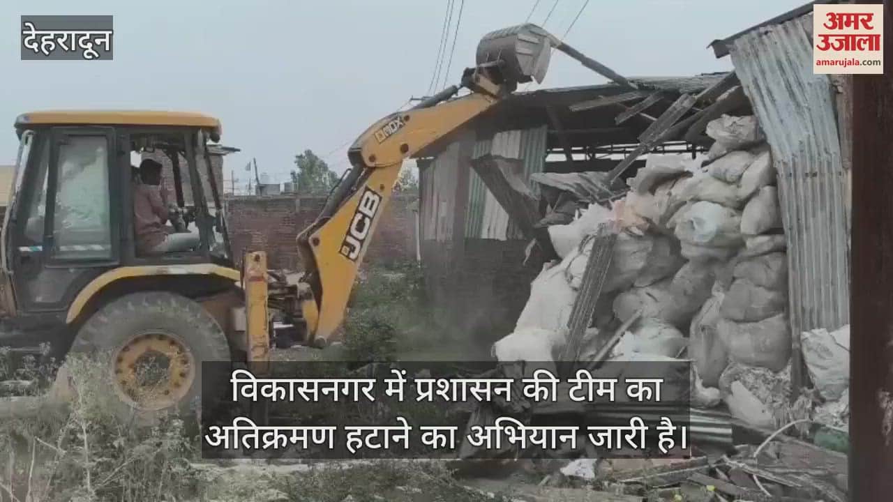 Administration team demolished factory built in the submerged area with the help of JCB