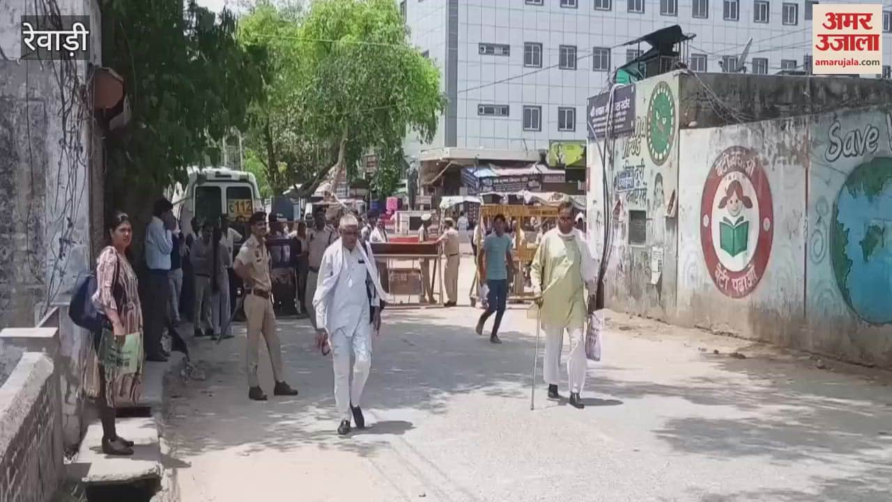 Police guard outside the examination centers in Rewari, entry is being given after thorough checking