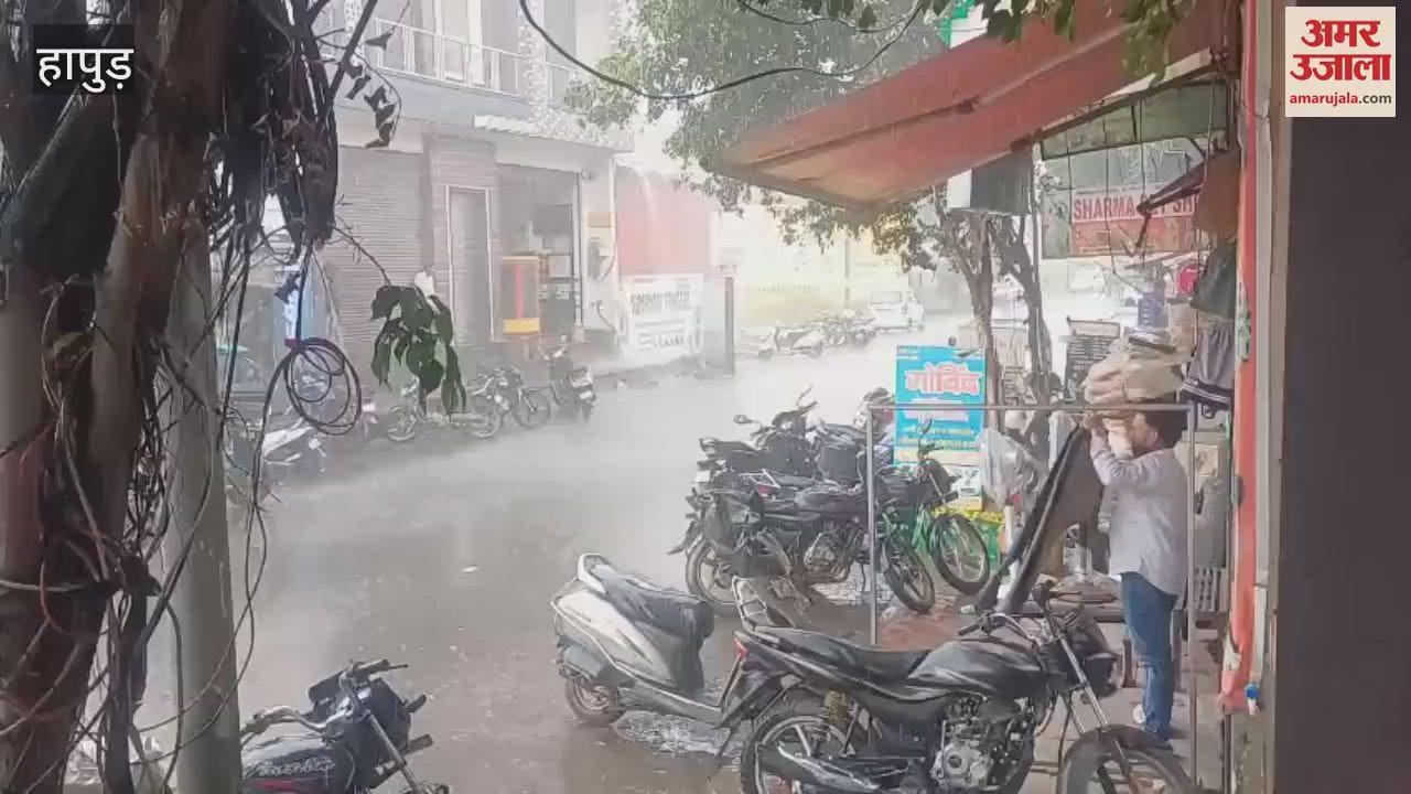 Heavy rain with strong winds in Hapur