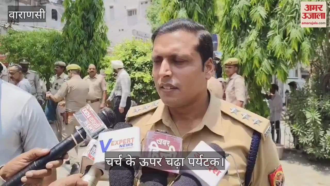 Foreign tourist climbed cathedral church in Varanasi