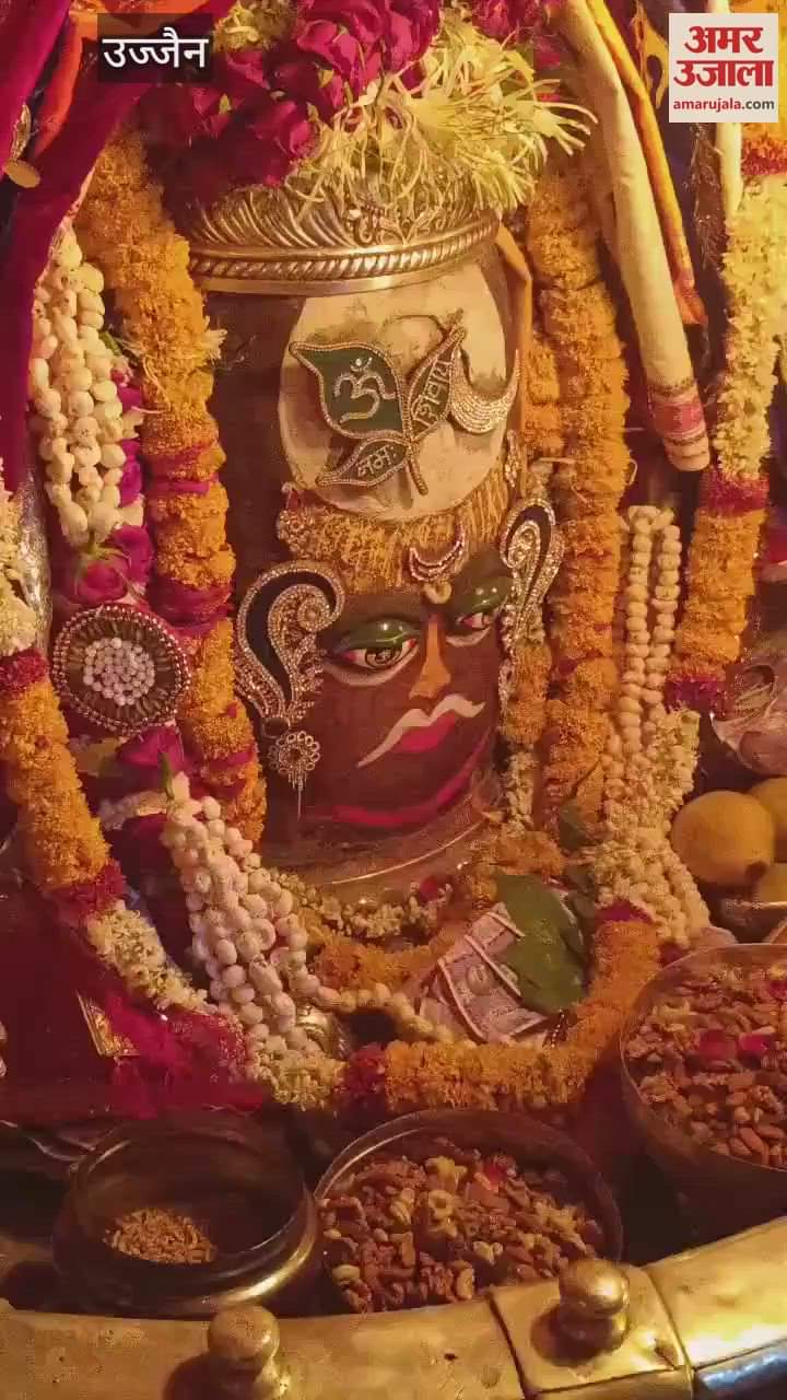 Baba Mahakal decorated with Belpatra and moon on his head during Buddha Purnima Bhasma Aarti