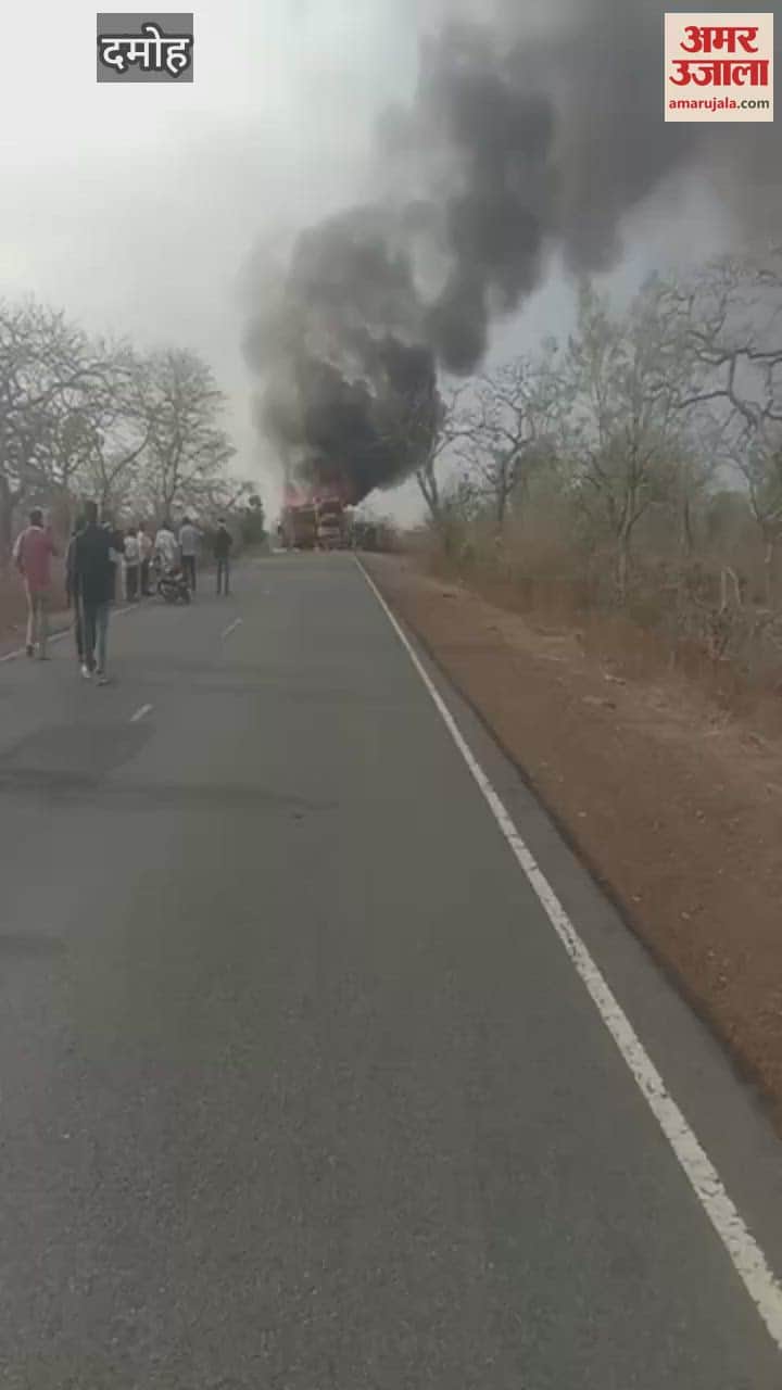 Two trucks collided and caught fire