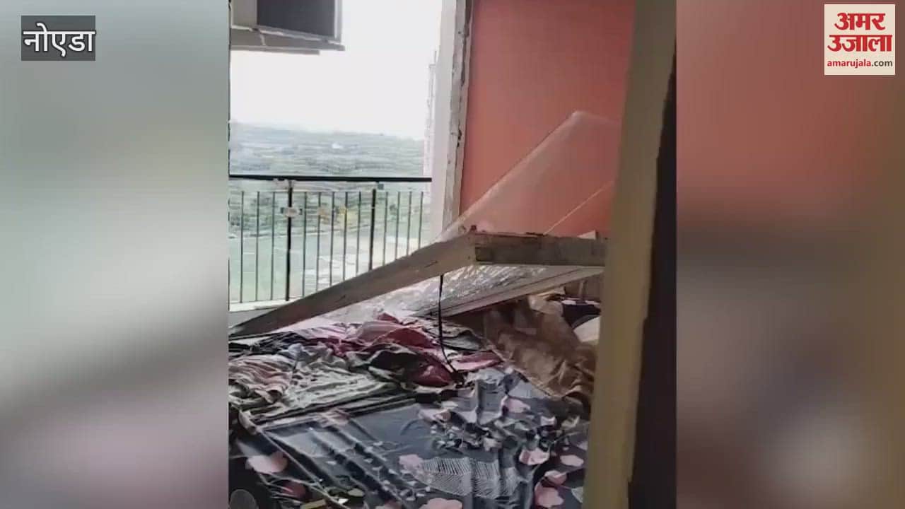 Doors and windows broken due to strong winds in Noida's society