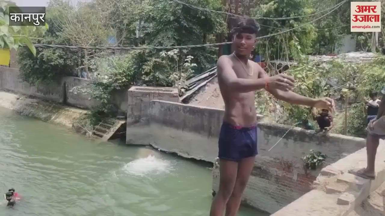 Young men are jumping into the canal from a height of 20 feet to make reels