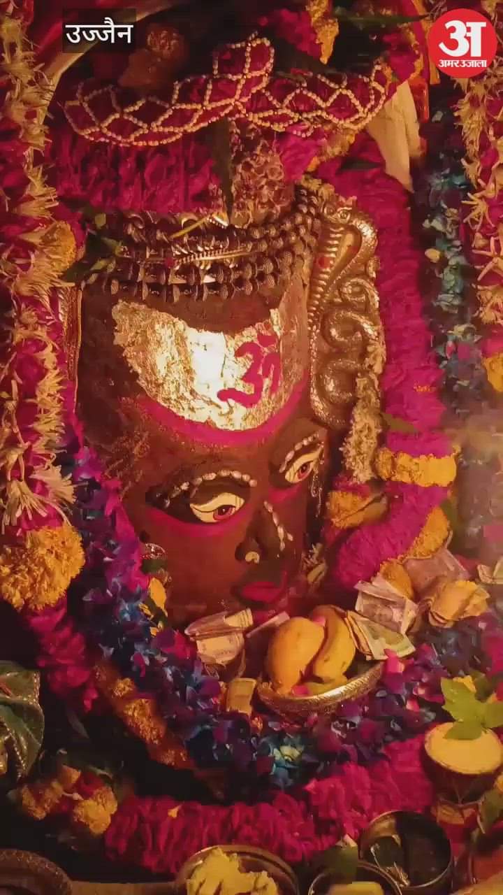 Baba Mahakal dressed with moon forehead, snake  neck and Rudraksha garland during Bhasma Aarti today