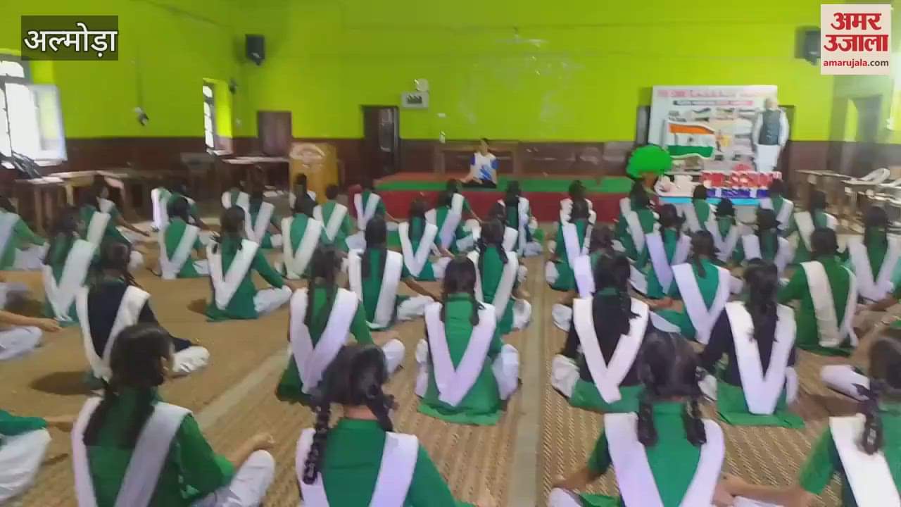 Children practiced yoga in yoga camp almora