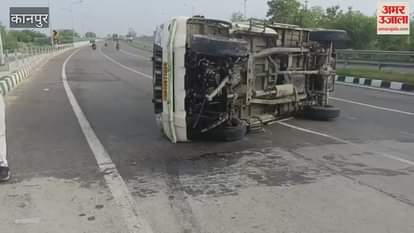 Pickup lost control and overturned after driver was talking on phone, two injured