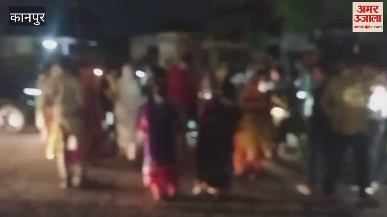 People blocked the road protesting against the opening of an English liquor shop