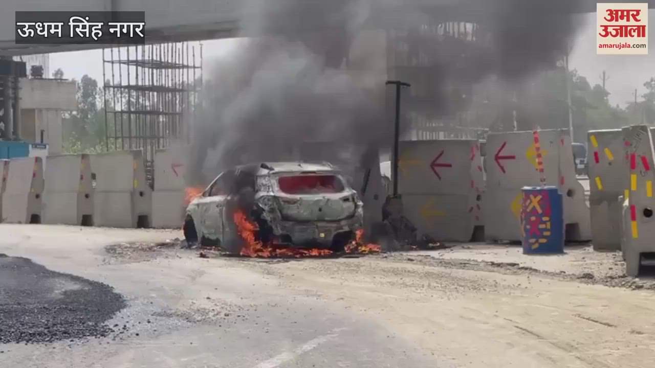 A car coming to Rudrapur with a patient from Nawabganj caught fire on Kashipur Road