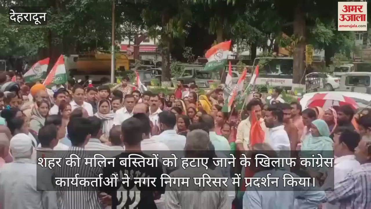 Congress staged a strong protest in the Municipal Corporation against the demolition of slums