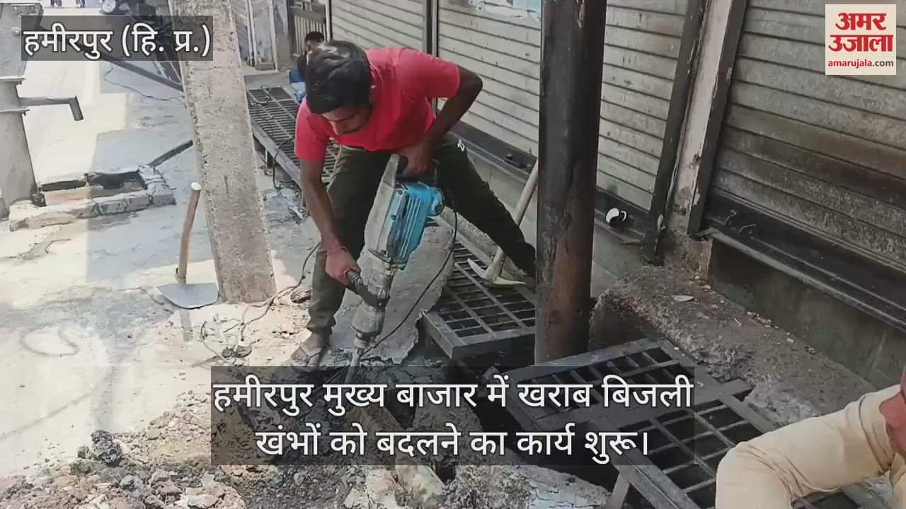 New electricity poles are being installed in place of damaged ones in the main market