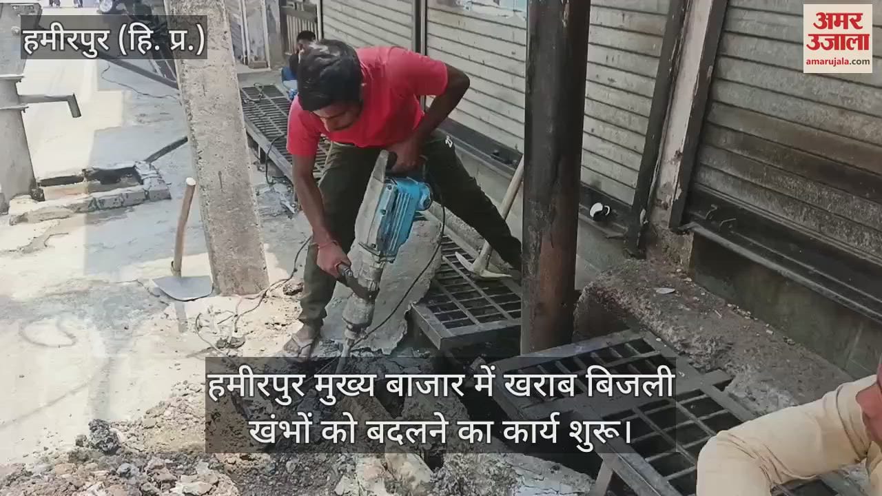New electricity poles are being installed in place of damaged ones in the main market