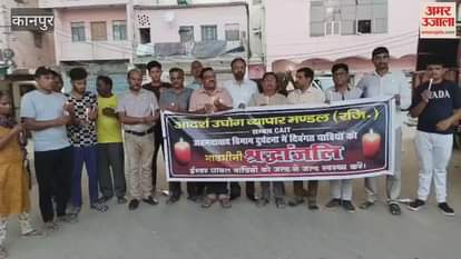 Traders paid tribute to the victims of the plane crash by taking out a candle march