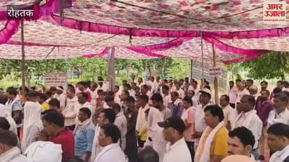 PGI contractual employees sit on dharna in Rohtak, pay tribute to those killed in Ahmedabad plane crash