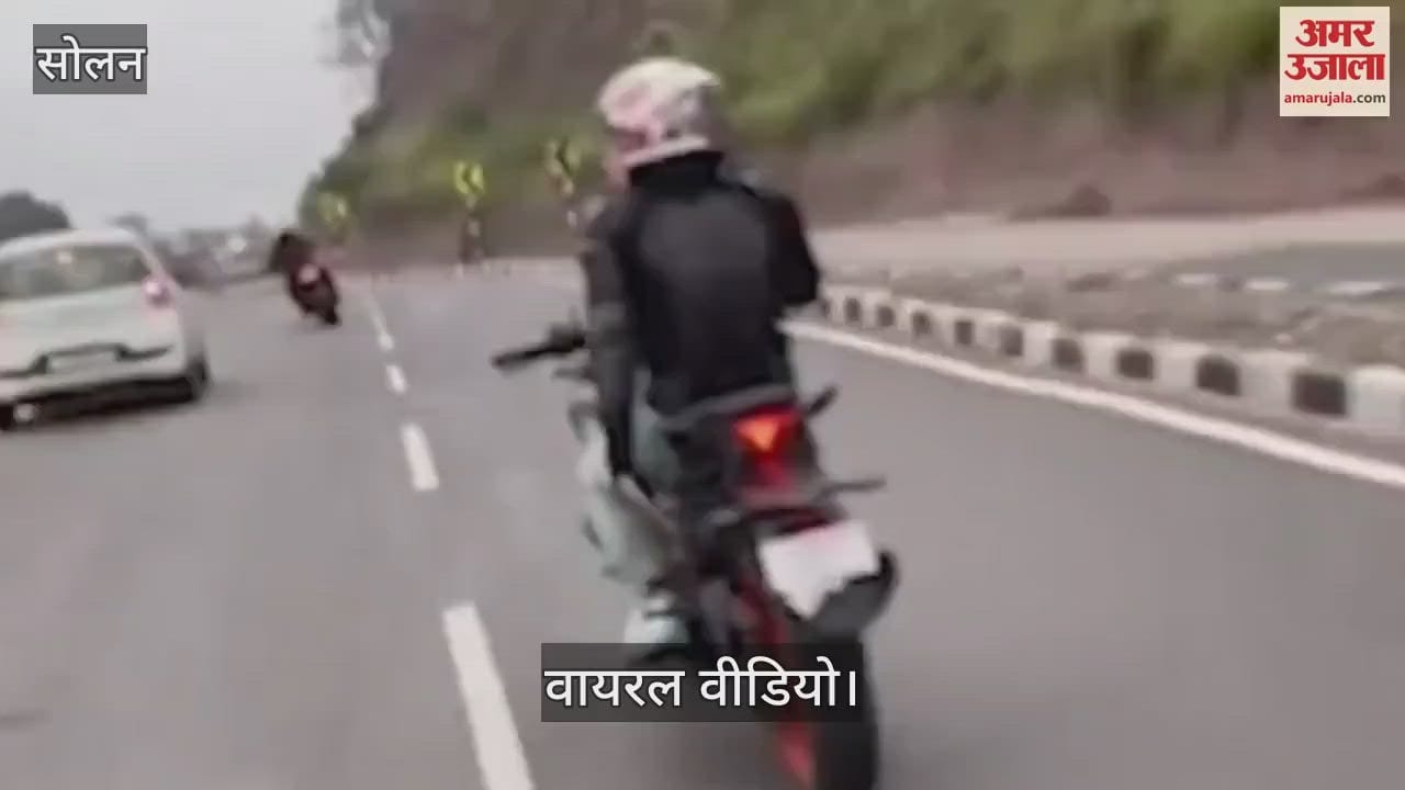 Watch Video Bike rider hits a car while doing stunt video is going viral on social media