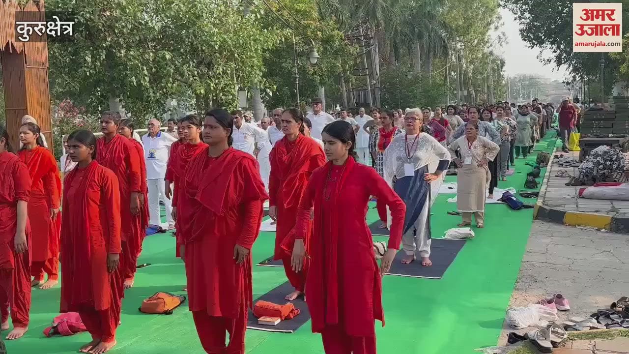 People practiced yoga on the banks of Brahma Sarovar in Kurukshetra
